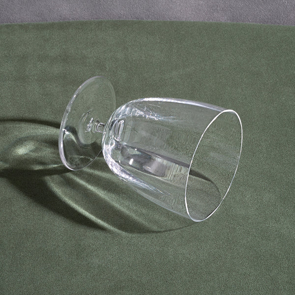 Iris Glassware on its side on a sage tablecloth